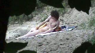 Hidden cam camera capturing couple on beach having fuck-a-thon in public