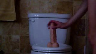 Wifey rides her big toy on the toliet