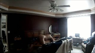 Intercourse in bedroom recorded on hidden camera on top of wardrobe